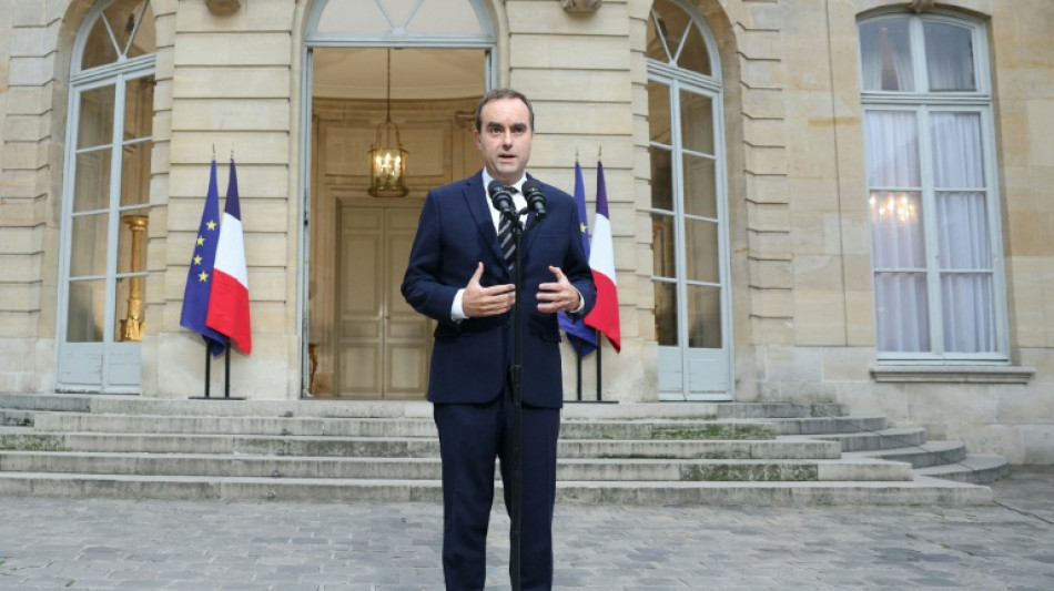Macron gives outgoing French PM final chance to salvage government