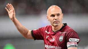 Departing Iniesta enjoys Barcelona send-off in Japan