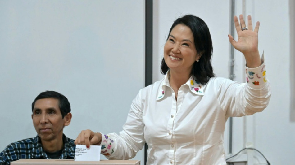  Peru exit polls show Fujimori ahead in ultra-tight presidential runoff 