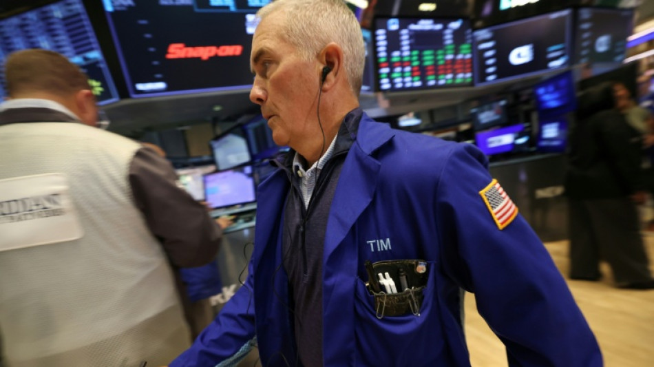  Wall Street termine en baisse, retient son souffle avant Jackson Hole 
