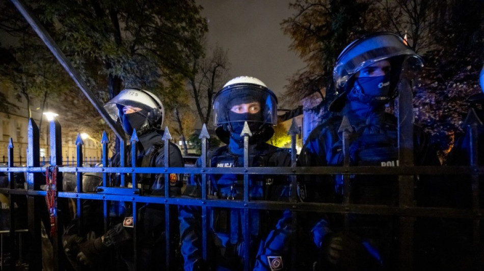  Polish riot police deployed after court chief suspended 