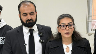Pakistani court jails rights activist and husband for 10 years