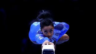 Biles wins 21st world title with all-around gymnastics gold