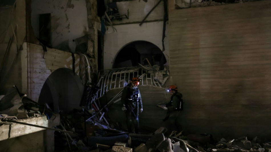  Iran missile strikes wound over 100 in two south Israel towns 