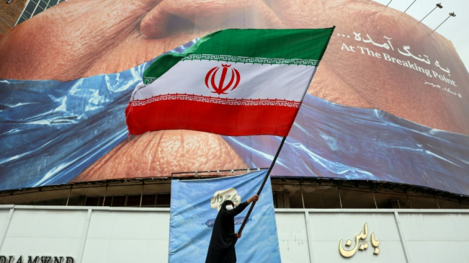  Oil sinks on Mideast deal, but Fed outlook knocks equities 