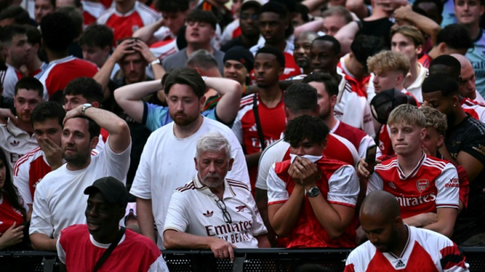  'Gutted' Arsenal fans lament Champions League loss 