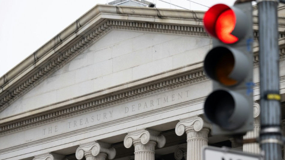  Stocks waver, dollar drops as US Treasury moves to lower bond yields 