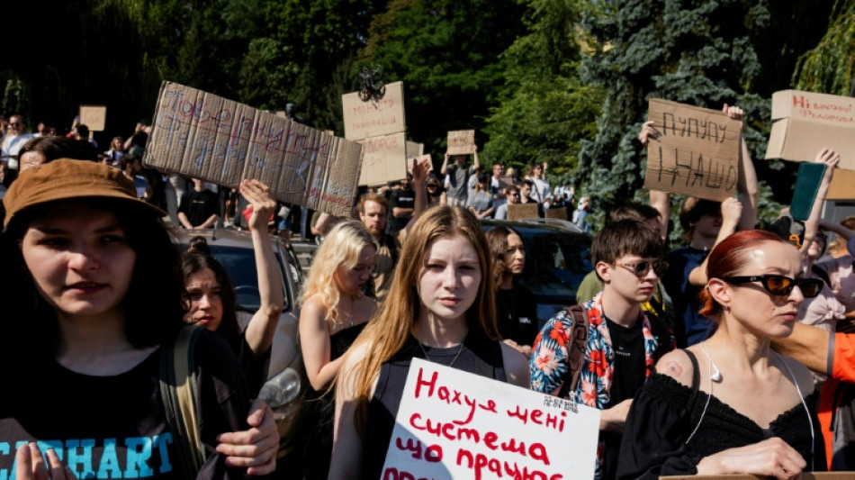  Protests erupt across Ukraine against defence minister's ouster 