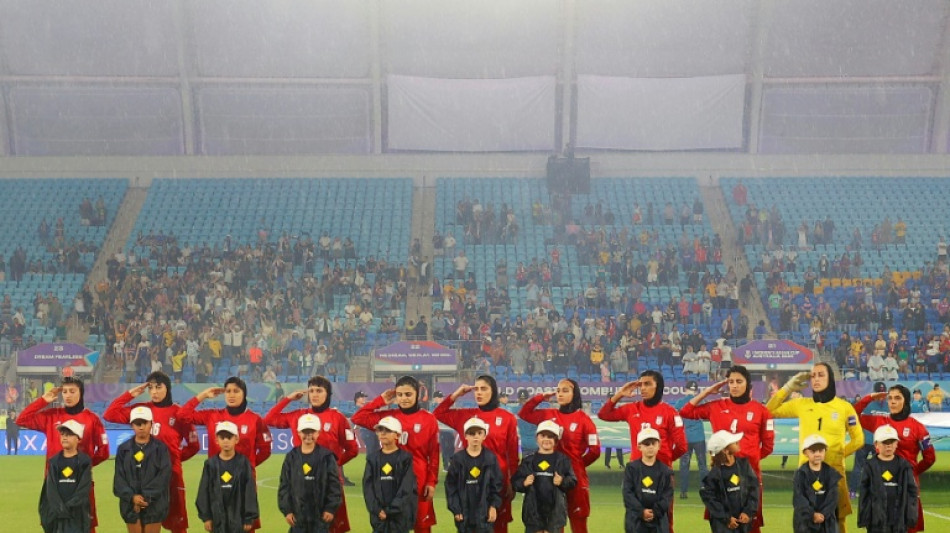 Iran players salute and sing national anthem at Women's Asian Cup