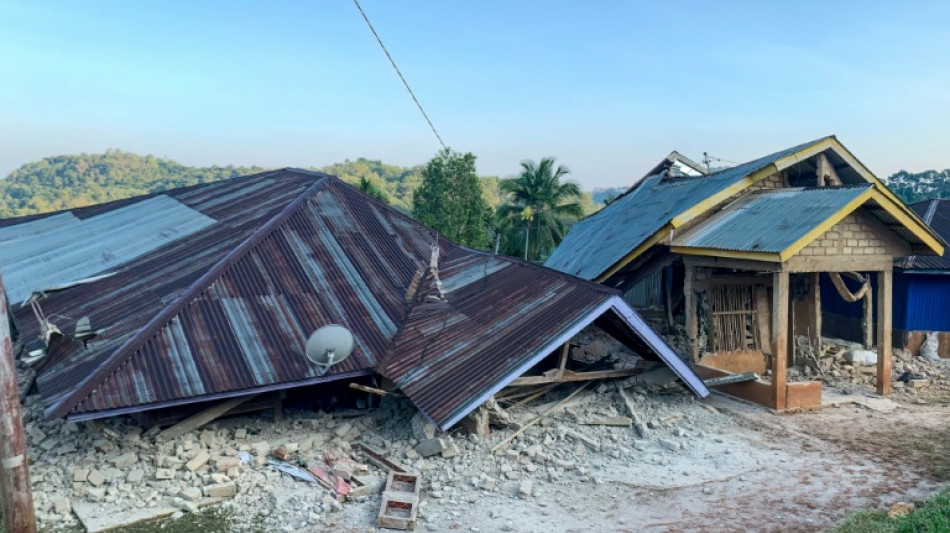  Powerful quake off Indonesia kills 20, sparks mass evacuations 