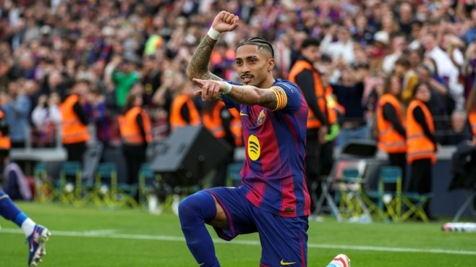  Raphinha hits treble as Liga leaders Barca thrash Sevilla 