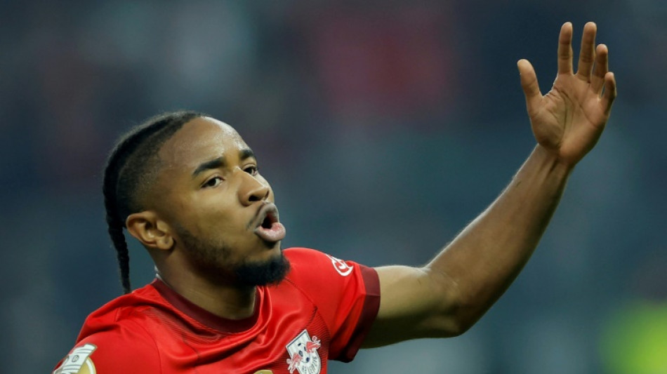Nkunku helps Leipzig defend German Cup win
