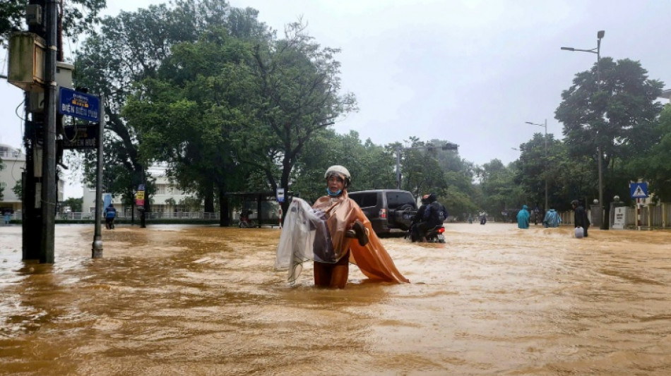 Record Vietnam rains kill four and flood 100,000 homes