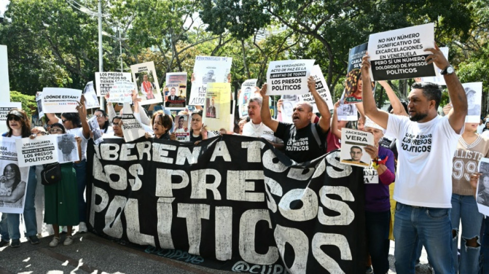 Venezuela moves to boost economy, amid anguish over pace of prisoner release