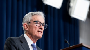 US stocks at records despite early losses on Fed independence angst