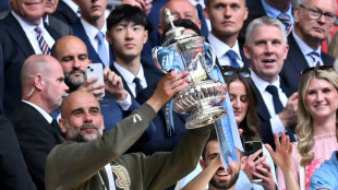 Guardiola targets Man City treble after FA Cup final win