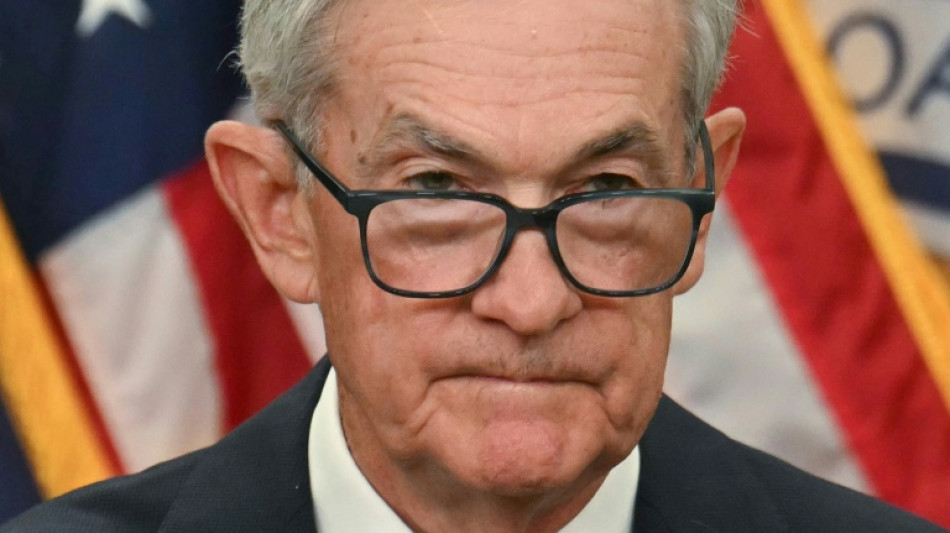  Stocks torn between Fed rate warning, AI optimism 
