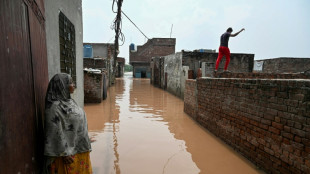 Smog then floods: Pakistani families 'can't catch a break'