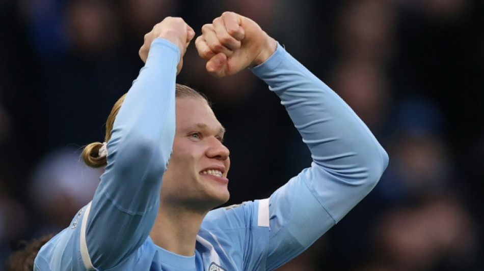 Haaland sends Man City top, Liverpool beat nine-man Spurs