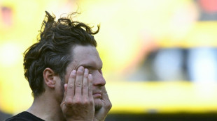 Dortmund face 'brutal' reality as title dream vanishes