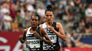 Kenya's Faith Kipyegon sets new women's 5,000m world record