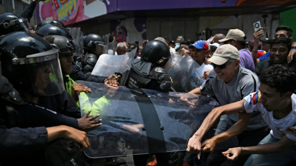  Venezuela police tear-gas protesters demanding salary rises 