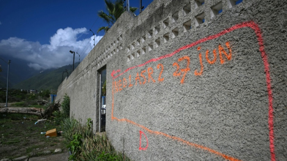  Spray-painted letters spell tragedy for Venezuela quake victims 