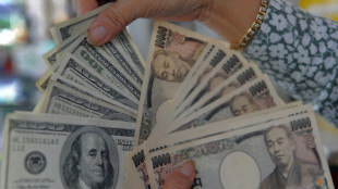 Dollar sinks on yen intervention talk, gold breaks $5,000