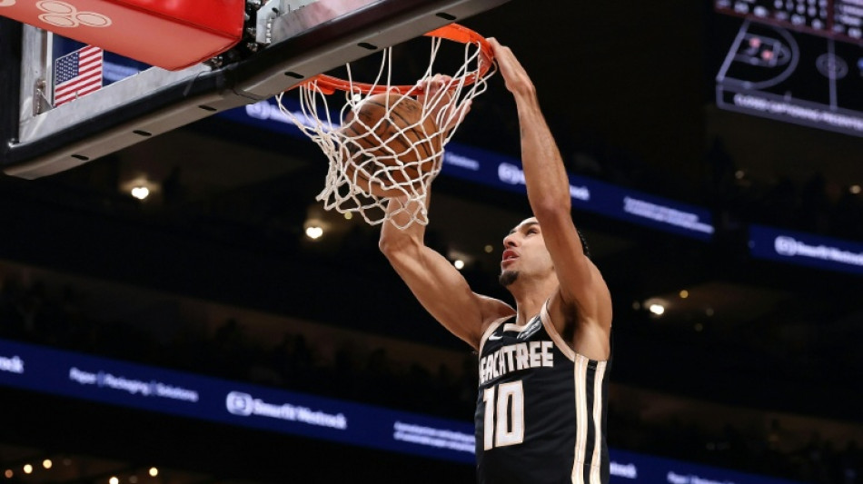  Three-team NBA trade sends Dort to Hawks, Risacher to Mavs: reports 