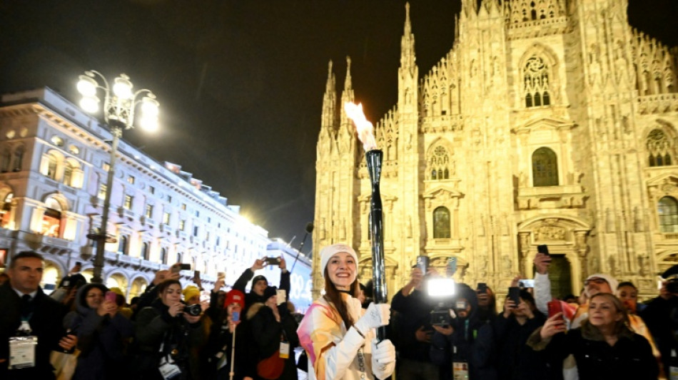  Flame arrives in Milan for Winter Olympics ceremony 