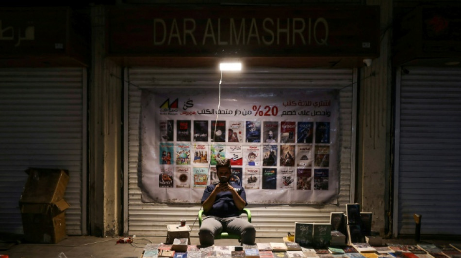  'Normal, but not really': Iraqis try to carry on as missiles fly 