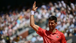 Djokovic eases into record 17th French Open quarter-final and 55th at Slams