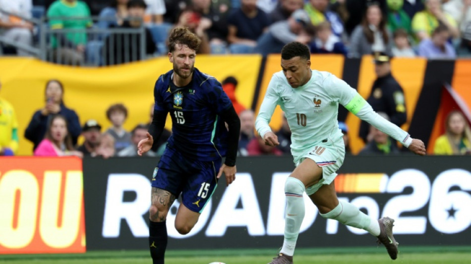  Mbappe on target as France shrug off red card to beat Brazil 