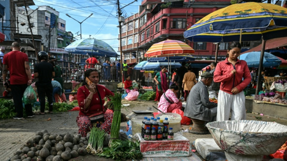  Nepalis assess damage after terror of deadly protests 