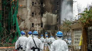 Hong Kong arrests suspects as fire death toll tops 150