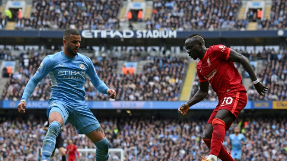 Walker feels Premier League title in 'City's hands' after Liverpool draw