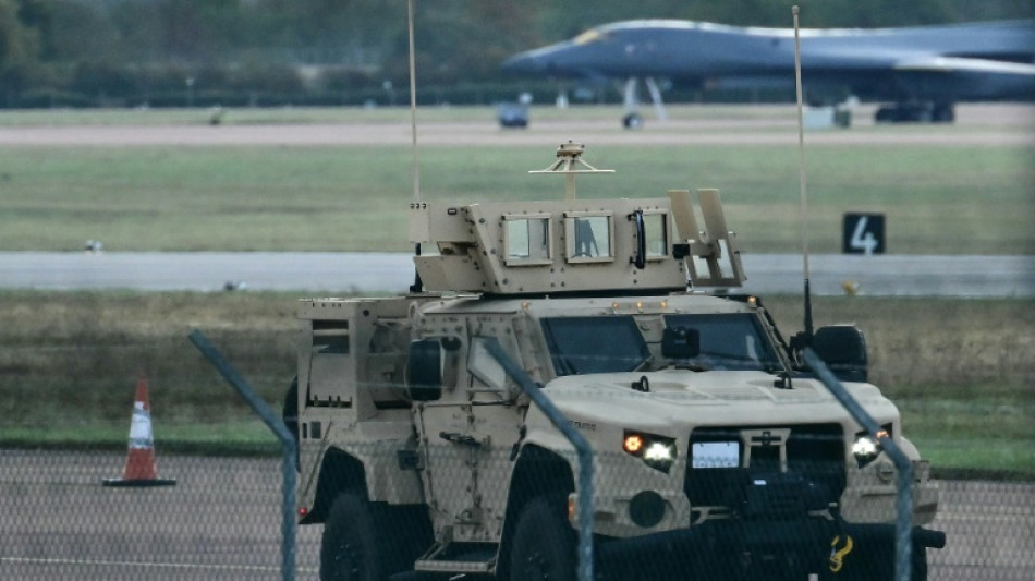 UK police release on bail five men held over airbase incident