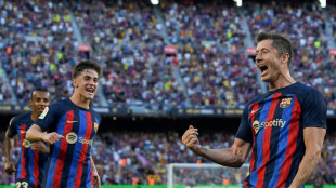 Lewandowski bags double for 'blessed' Barca, Benzema srikes late for Real 