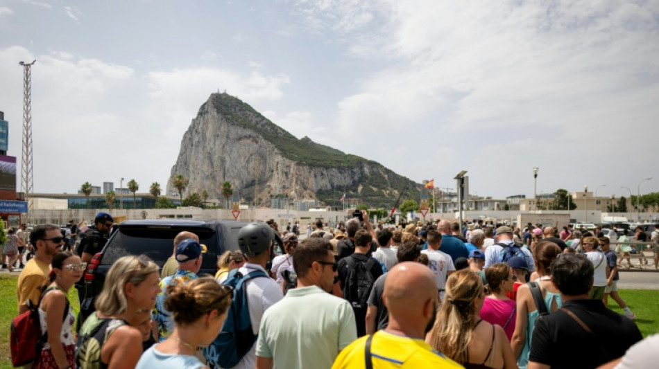  Crowds cross Gibraltar-Spain frontier as border controls vanish 