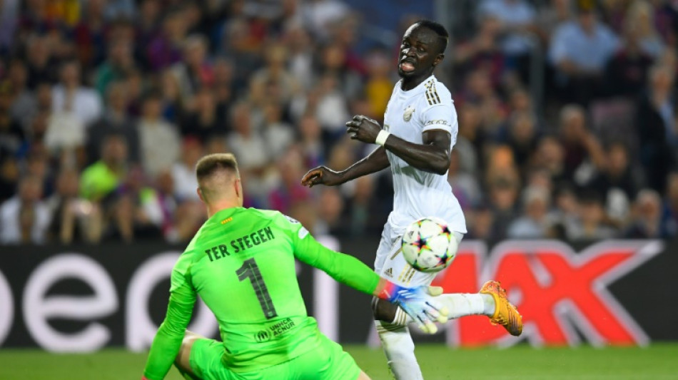 Bayern seal top spot as eliminated Barca fail to salvage pride