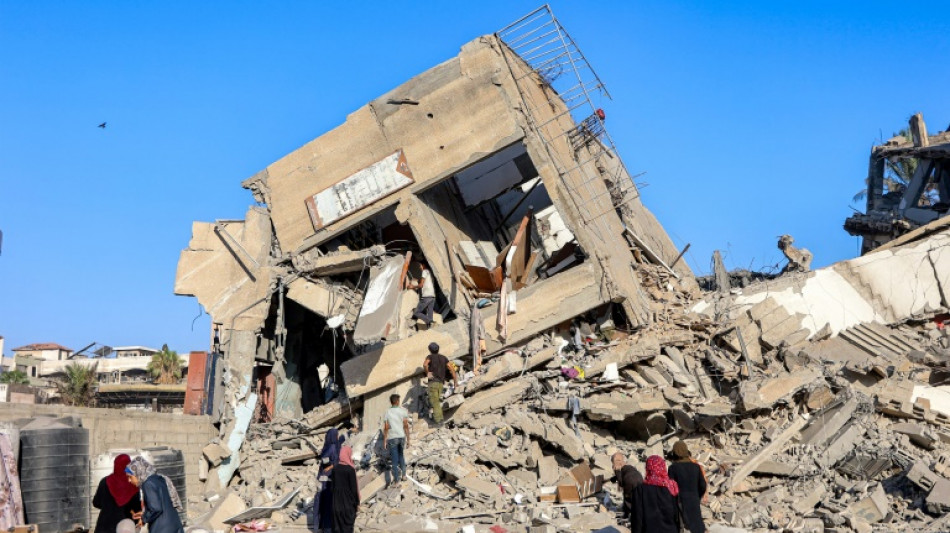 'World watches our slaughter': Gazans flee Israeli assault on urban hub 