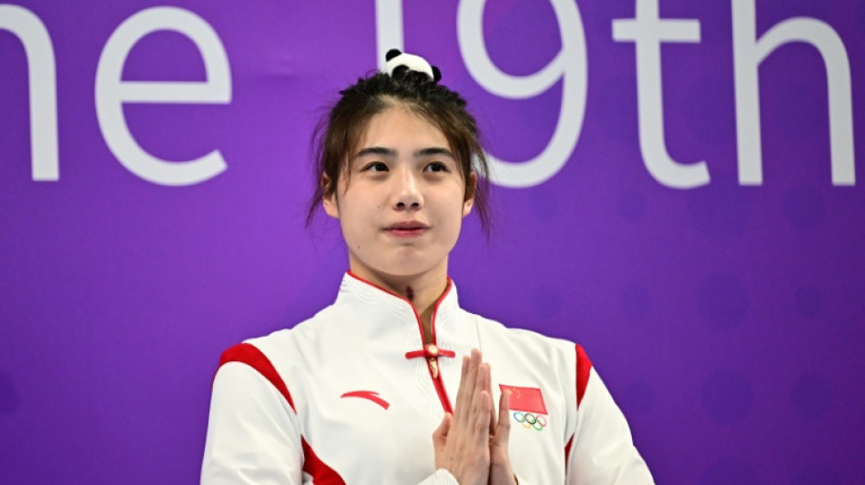 Chinese swimmers Zhang and Qin named Asian Games MVPs 