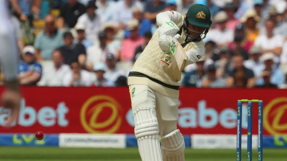Khawaja keeps England at bay after Broad strikes in Ashes opener