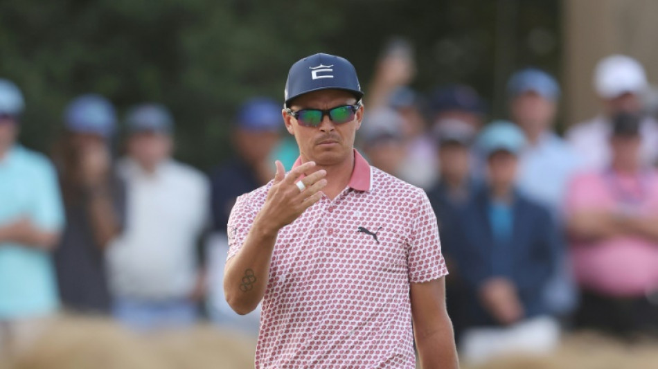 Fowler, Clark lead McIlroy by one after US Open third round