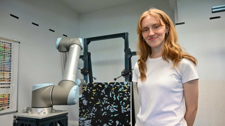  AI-backed robot painting aims to boost artist income 