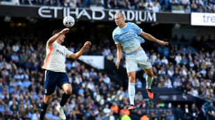 Haaland heads unconvincing Man City top of Premier League
