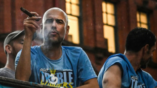 Manchester weather fails to rain on Man City's treble parade