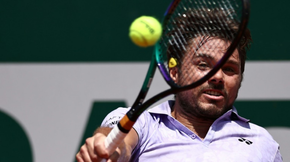 Wawrinka triumphs in four-hour 35-minute French Open marathon
