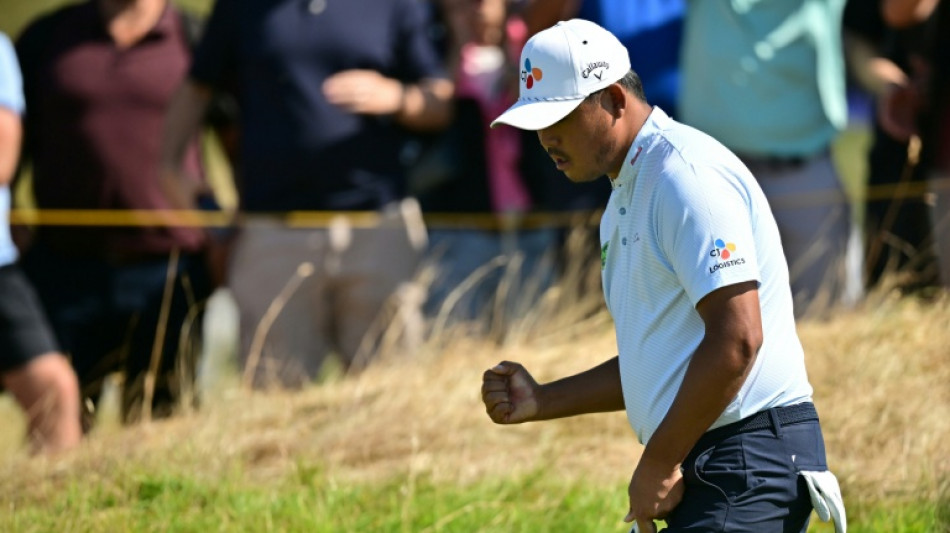  Kim leads British Open as Young charges into clubhouse lead 