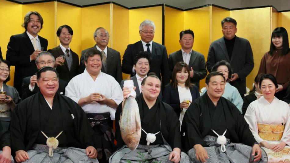 Ukrainian sumo wrestler earns record-breaking promotion
